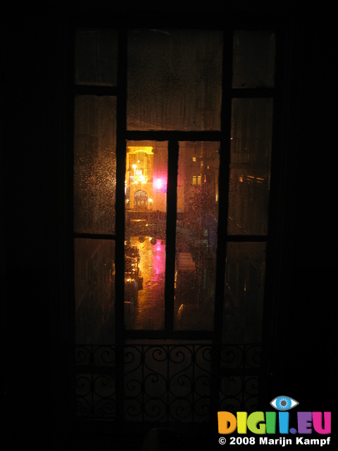 28416 Rain on window and reflected lights in alley at Kiev appartment